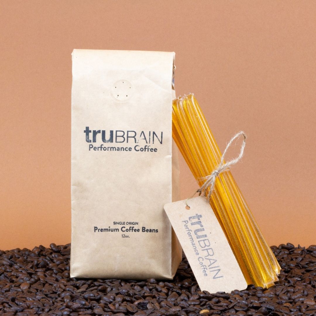Closeup hero shot of TruBrain’s Coffee Kit, with Whole Bean TruBrain Coffee with no-taste Nootropic Topping of L-theaninne for a smooth, low acid coffee experience